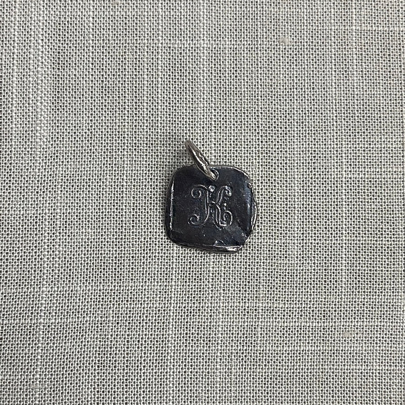 Waxing Poetic Baby Insignia Initial Charm- Silver